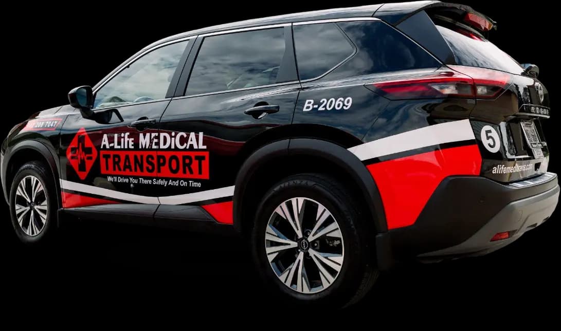 An A-Life Medical Transport wheelchair van in company livery.